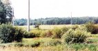 Вид на дорогу и перекресток, где Колобанов уничтожал немецкие танки. Снимок сделан с предполагаемого места позиции КВ
